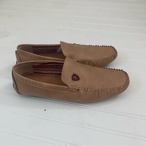 Giovanni Ferrari being driving shoe